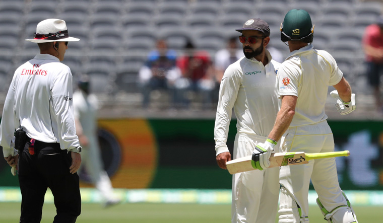 Paine not annoyed, relishes 'going head-to-head' with Kohli