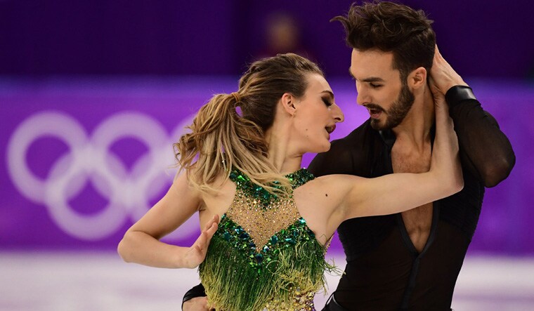 France's Gabriella Papadakis and Guillaume Cizeron compete in the ice dance short dance of the figure skating event | AFP