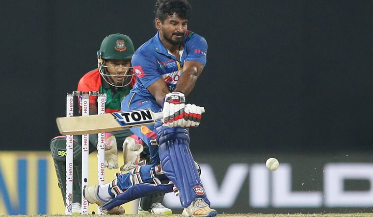 Sri Lanka's Kusal Perera plays a shot against Bangladesh during their Twenty20 match in the Nidahas triangular series in Colombo | AP