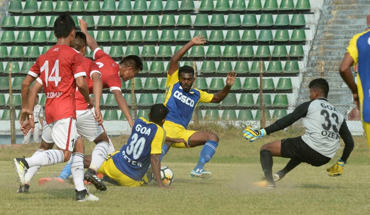 Goa and Mizoram players in action in their opening Group B game of the Santosh Trophy, at the Rabindra Sarobar Stadium in Kolkata | Salil Bera