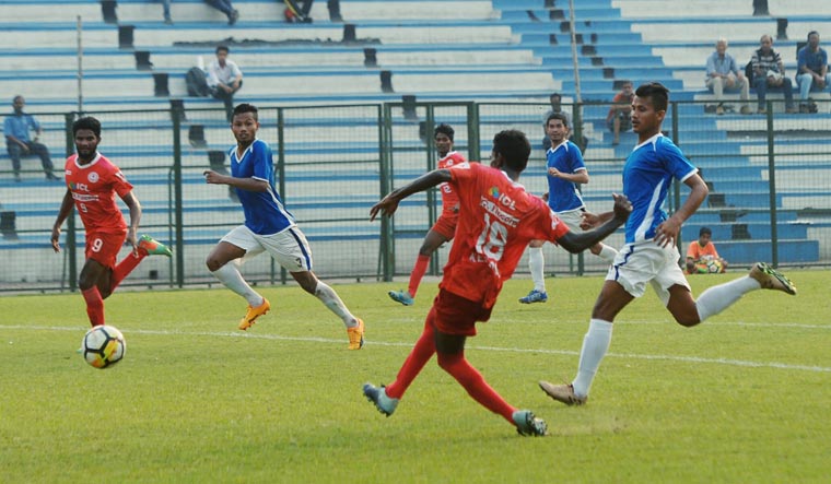 Players of Kerala and Manipur in action at the Sailen Manna Sports Complex in Howrah during the 72nd national championship for Santosh Trophy | Salil Bera