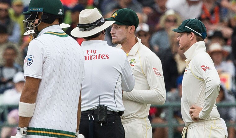 Cameron Bancroft of Australia talks to the umpire on the third day of the third cricket test between South Africa and Australia at Newlands Stadium, in Cape Town, South Africa | AFP