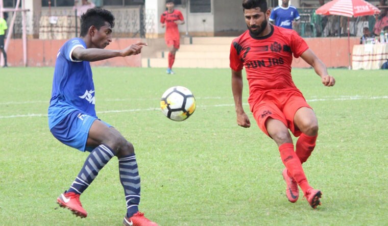 Players of Punjab and Karnataka in action at the 72nd edition of the national football championship for the Santosh Trophy, in Kolkata | aiff.com