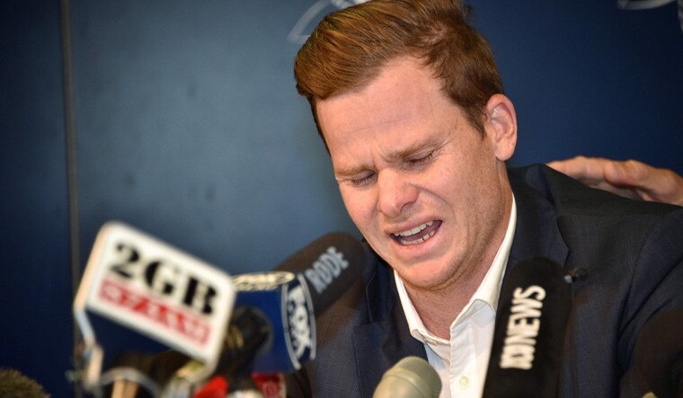 Steve Smith broke down during a press conference at the Sydney airport | AFP