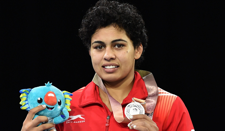 Pooja Dhanda won silver in the women's 57kg wrestling final 
