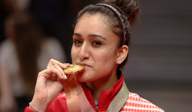 India's Manika Batra after winning the gold medal in women's singles table tennis | Reuters