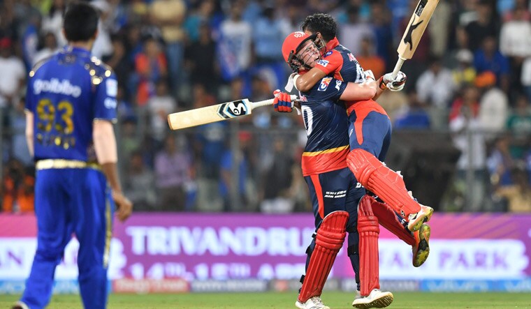 Delhi Daredevils players Jason Roy (centre) and Shreyas Iyer celebrate their win over Mumbai Indians | AFP