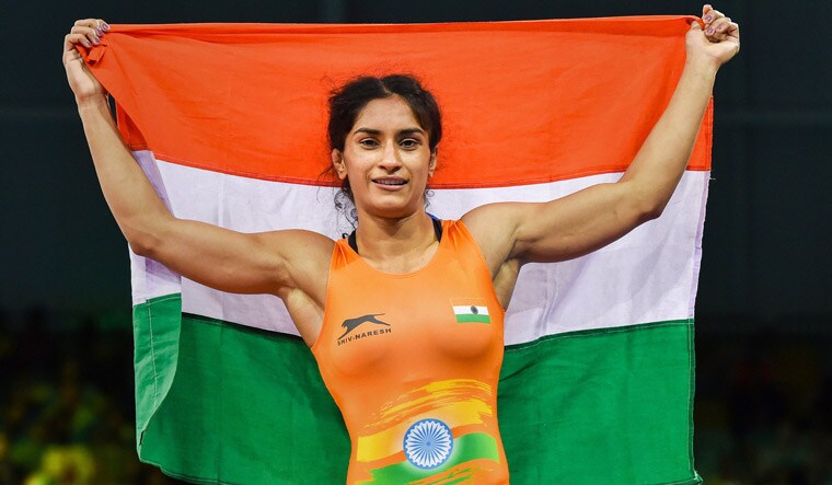 Vinesh Phogat celebrates after winning gold medal WFS 50kg wrestling Nordic bout during the Commonwealth Games 2018 in Gold Coast | PTI
