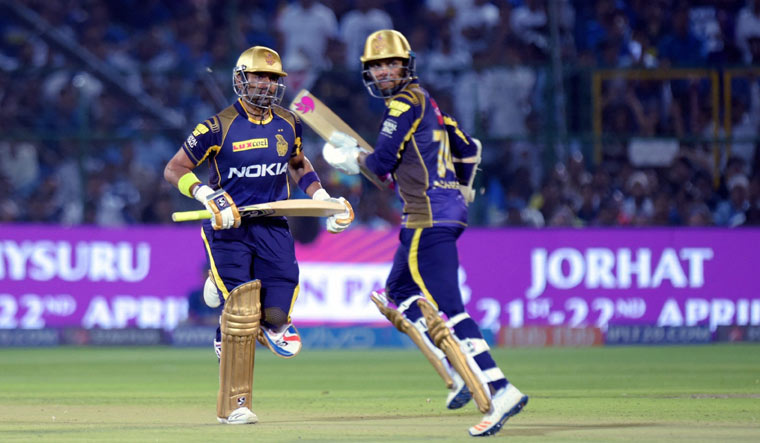 Kolkata Knight Rider batsmen Robin Uthappa and S.P. Narine run between the wicket | PTI
