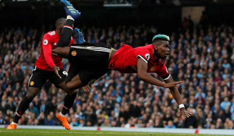 Manchester United's Paul Pogba scores their first goal | Reuters