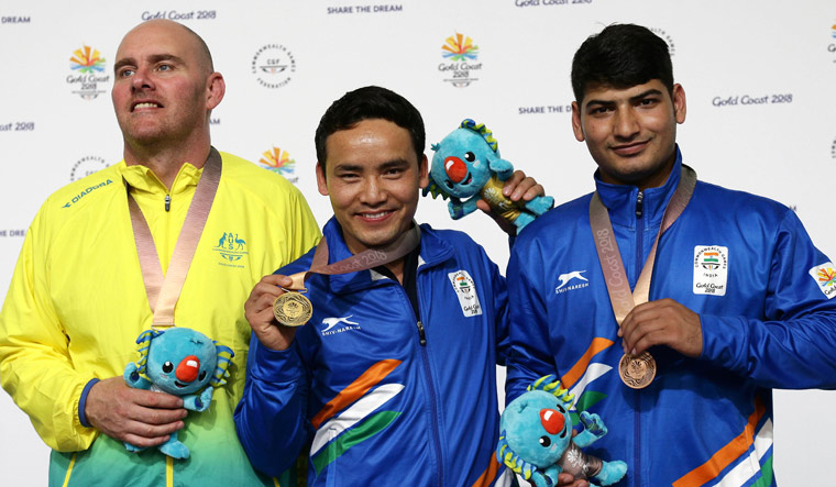 Record-breaking Jitu wins gold, Mitharval bags bronze in 10m air pistol