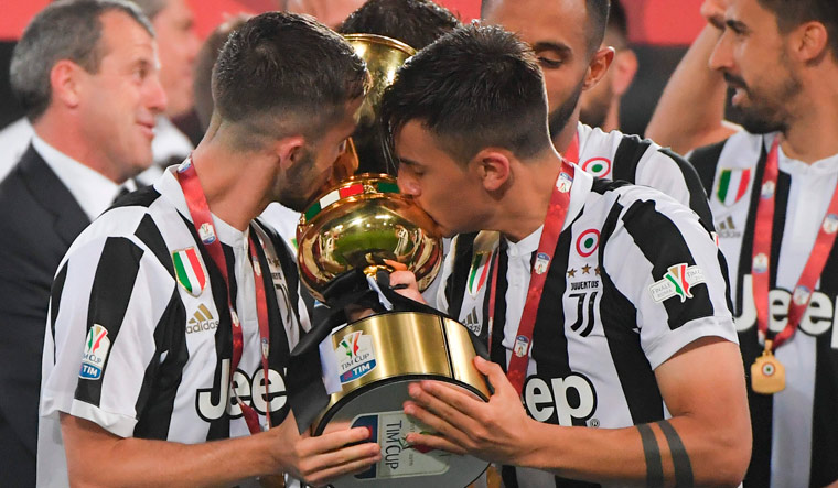 Juventus won the Coppa Italia with a crushing 4-0 victory over AC Milan