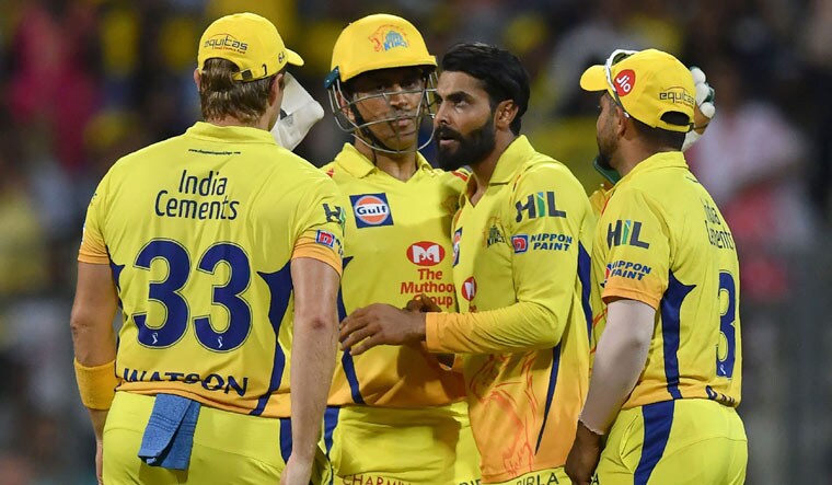 Ravindra Jadeja (2R) celebrates with his CSK teammates after taking the wicket of Sunrisers Hyderabad batsman Manish Pandey during the 2018 IPL first qualifier match at the Wankhede Stadium in Mumbai | AFP