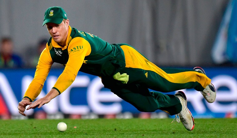 (File) AB de Villiers dives to stop the ball during the ICC World Cup 2015 semifinal against New Zealand at Eden Park in Auckland | AFP