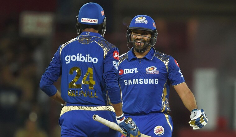 Mumbai Indians captain Rohit Sharma (right) celebrates with teammate Krunal Pandya after their win over Kings XI Punjab | AFP