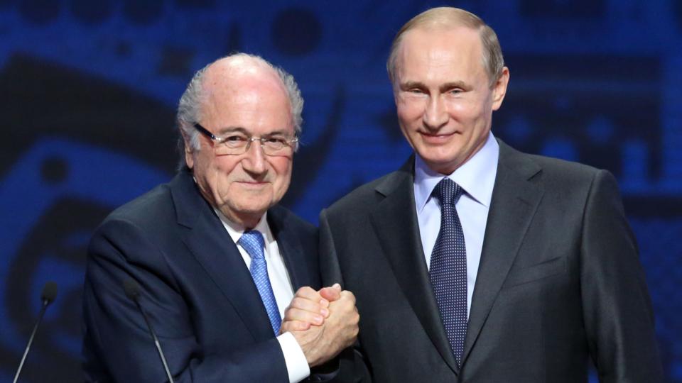 (File) FIFA president Sepp Blatter (left) shakes hands with Russian President Vladimir Putin ahead of the preliminary draw for the 2018 World Cup qualifiers at the Konstantin Palace in Saint Petersburg | AFP