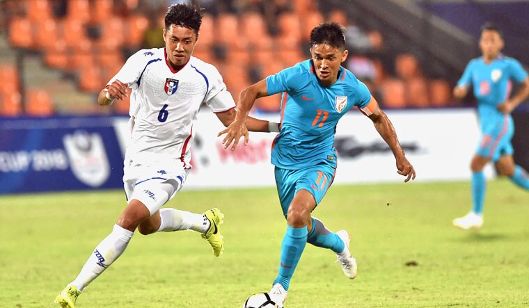 Indian player Sunil Chhetri (R) and Chinese Taipei player Wei-Chuan Chen (L) vie for the ball during the Hero Intercontinental football Cup in Mumbai on Friday | PTI 
