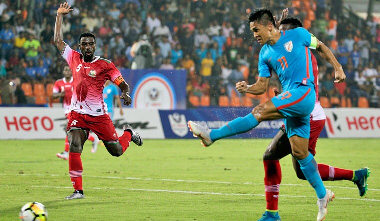 India's soccer player Sunil Chhetri, right, vies for the ball with unidentified Kenya players during the Hero Intercontinental Cup final match in Mumbai | AP