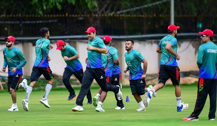 Afghanistan players train during a practice session on the eve of their Test debut | PTI 