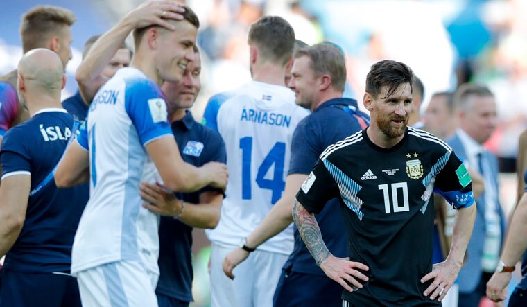 Argentina's Lionel Messi (right) stands near the Iceland's players at the end of the group D match at the 2018 World Cup in the Spartak Stadium in Moscow | AP