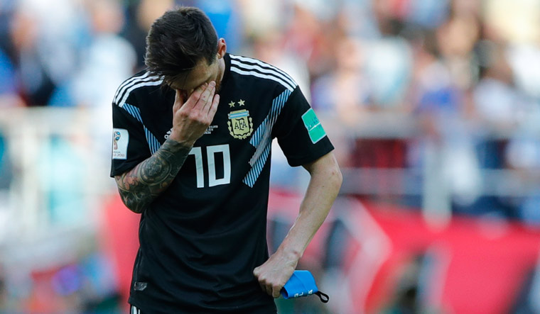 Lionel Messi reacts at the end of the Group D match between Argentina and Iceland | AP