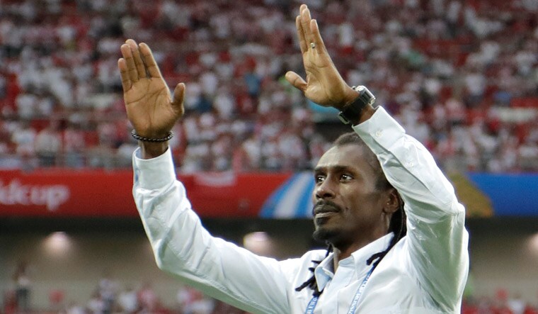 Senegal's head coach Aliou Cisse celebrates after his team beat Poland in a group H match at the 2018 World Cup, at the Spartak Stadium in Moscow | AP