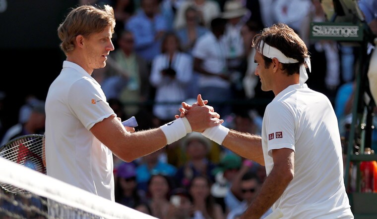 Kevin Anderson greets Roger Federer after defeating him in the quarterfinal of the Wimbledon Championships 2018 | Reuters