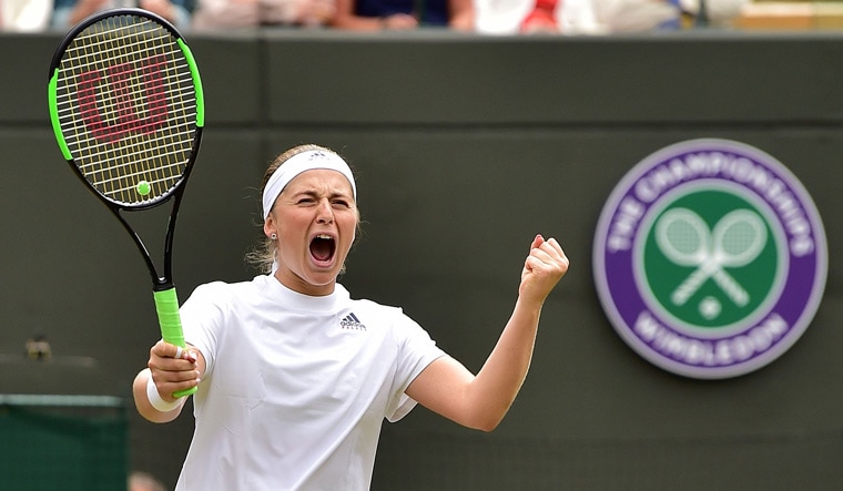 Latvia's Jelena Ostapenko celebrates after winning against Slovakia's Dominika Cibulkova | AFP