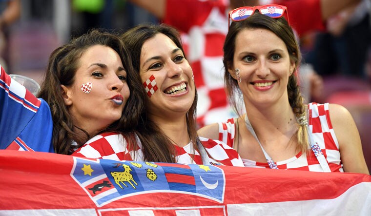Croatia fans cheer before the match between Croatia and England at the Luzhniki Stadium in Moscow on July 11 | AFP