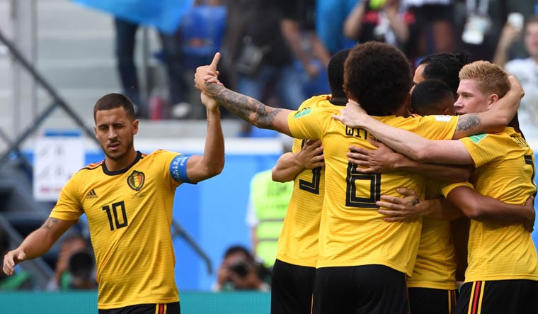 Belgium's Eden Hazard (left) reacts after Thomas Meunier scored during their opening goal in the third place play-off at the St Petersburg Stadium | AFP