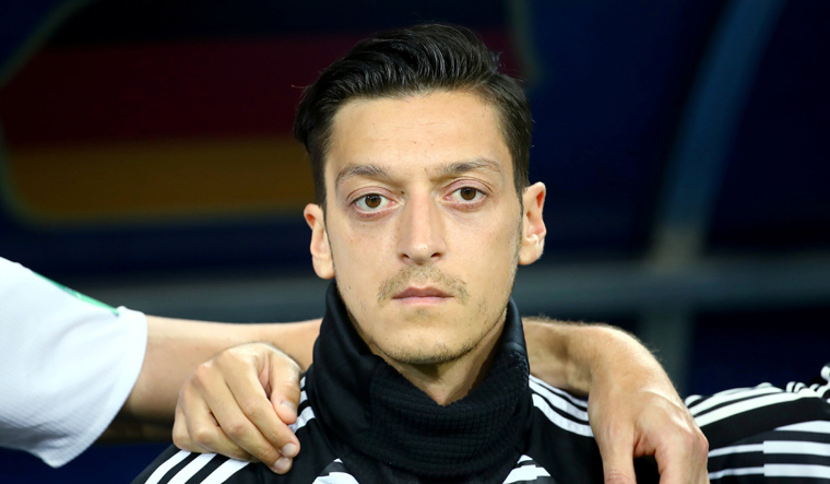 Mesut Ozil quits German national side citing racism over Turkish heritage