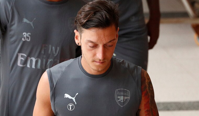 Mesut Ozil attends a training session in Singapore on Wednesday | Reuters 