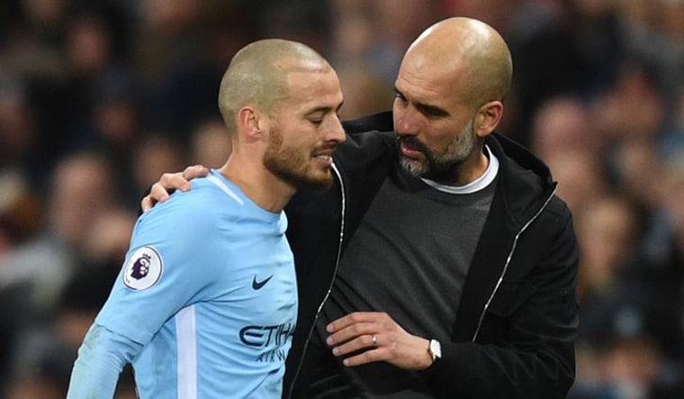 (File) David Silva (left) with coach Pep Guardiola