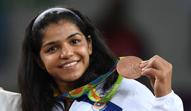 Only we know how we face people when we return without medal: Sakshi