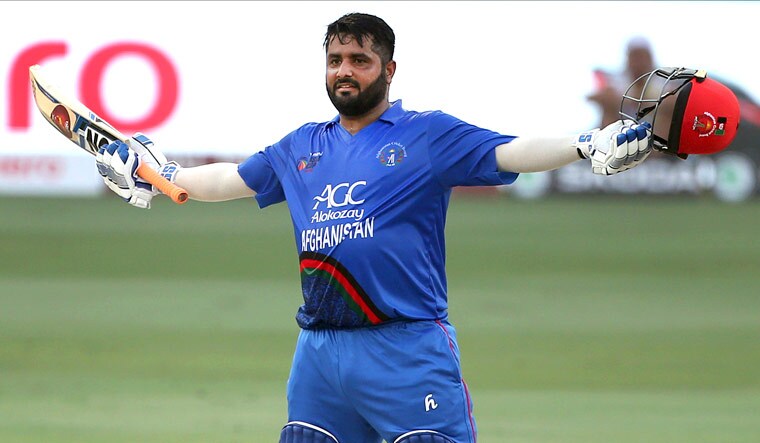 Mohamad Shahzad celebrates after scoring a century against India during a Super Four match of the Asia Cup in Dubai | AP