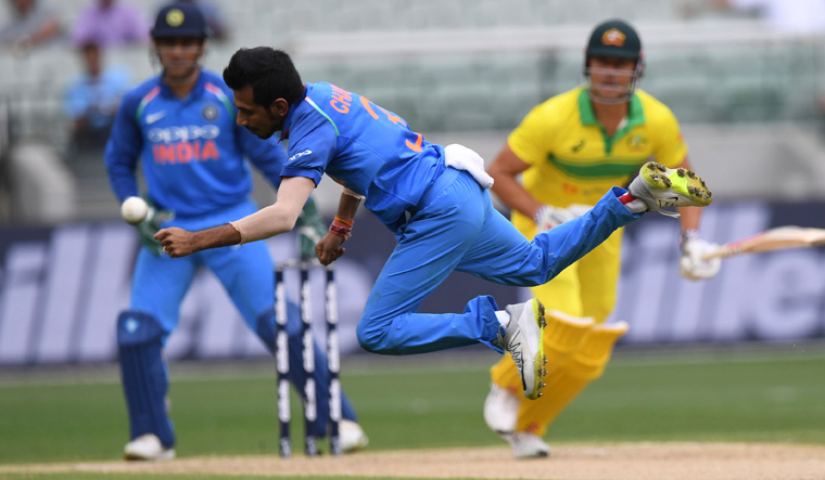 Melbourne ODI: Chahal shines as India restrict Australia to 230 