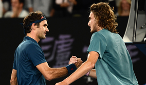 Roger Federer and Stefanos Tsitsipas after their quarterfinal match | AFP