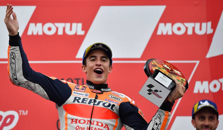 Japanese Grand Prix winner Repsol Honda's Marc Marquez of Spain celebrates on the podium | AFP