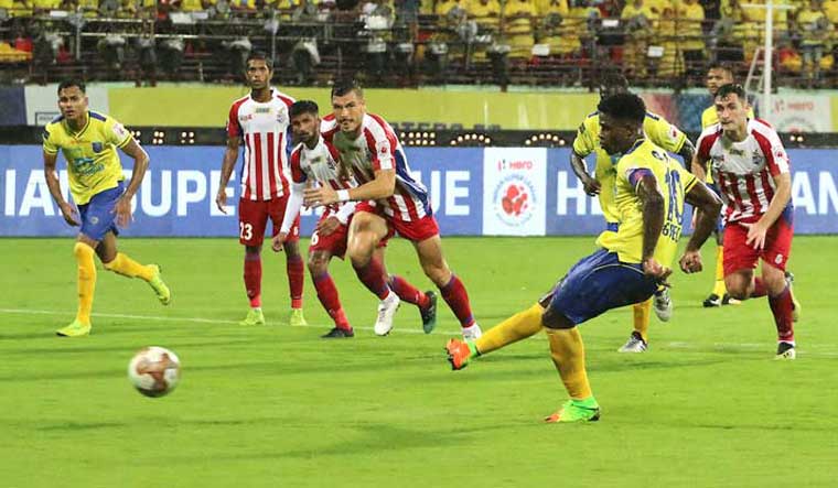 Ogbeche scores a penalty for the Kerala Blasters against ATK in the ISL opener at the Jawaharlal Nehru Stadium, in Kochi | isl.com