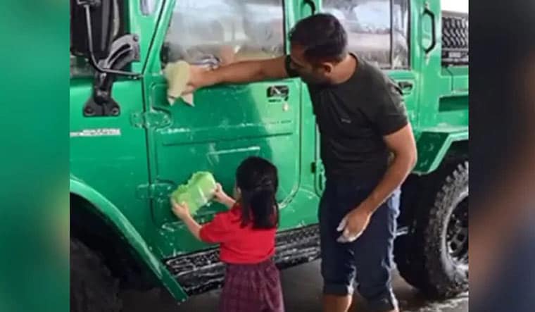Dhoni with his daughter Ziva | via Instagram