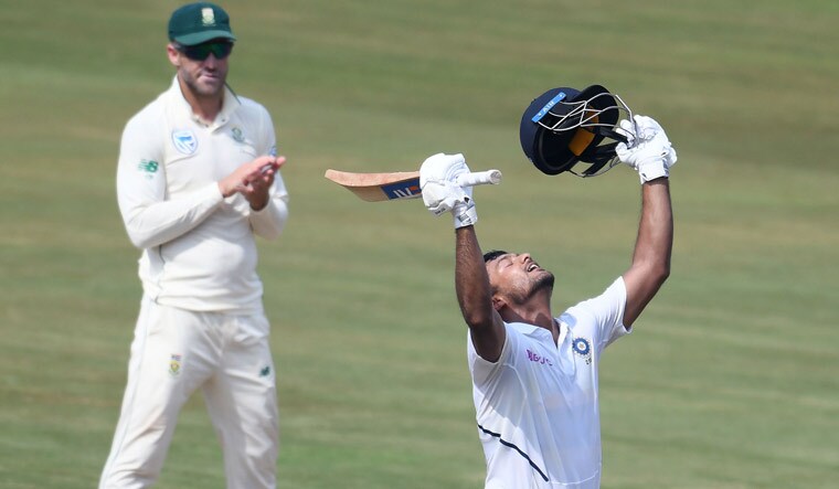 India's Mayank Agarwal celebrates scoring 200 runs on day 2 of the first Test match against South Africa | AFP
