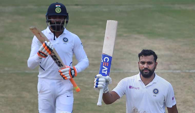 Rohit Sharma celebrates his century as teammate Ravindra Jadeja applauds | PTI