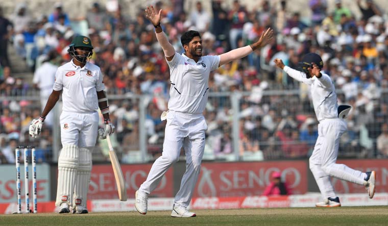 Umesh Yadav dismisses Al-Amin Hossain to win the Day/Night Test for India, at Eden Gardens in Kolkata | Salil Bera