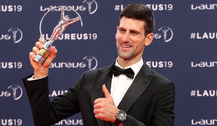 Novak Djokovic equalled Usain Bolt by winning the top Laureus award for the fourth time | AFP