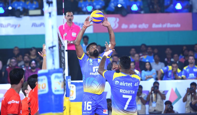Kochi Blue Spikers captain Mohan Ukkrapandian (blue jersey no. 16) in action against the U Mumba Volley during the opening match of the Pro Volleyball League, in Kochi