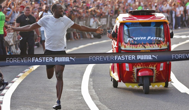 Usain Bolt beats Peruvian tuk-tuk in race