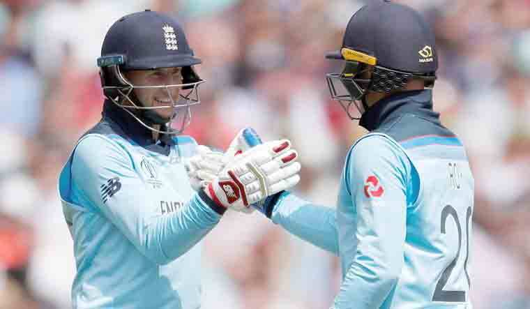 England's Jason Roy celebrates reaching a half century with Joe Root | Reuters