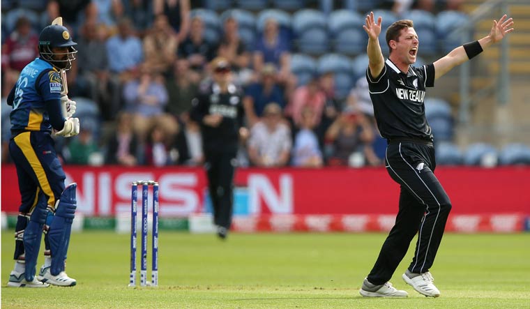 Matt Henry (centre) successfully appeals after review for the wicket of Sri Lanka's Lahiru Thirimanne (left) during the ICC Cricket World Cup group stage match in Cardiff, Wales | AP