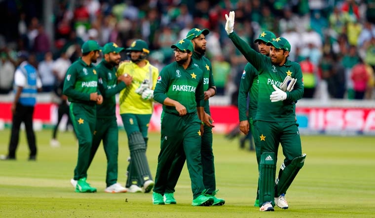 Pakistan's captain Sarfaraz Ahmed waves to the crowd after their win against South Africa at Lord's Cricket Ground | AFP