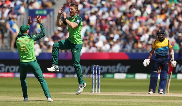 South Africa's Dwaine Pretorius celebrates taking the wicket of Sri Lanka's Kusal Mendis during their World Cup group stage match at Riverside Ground, Chester-le-Street | Reuters
